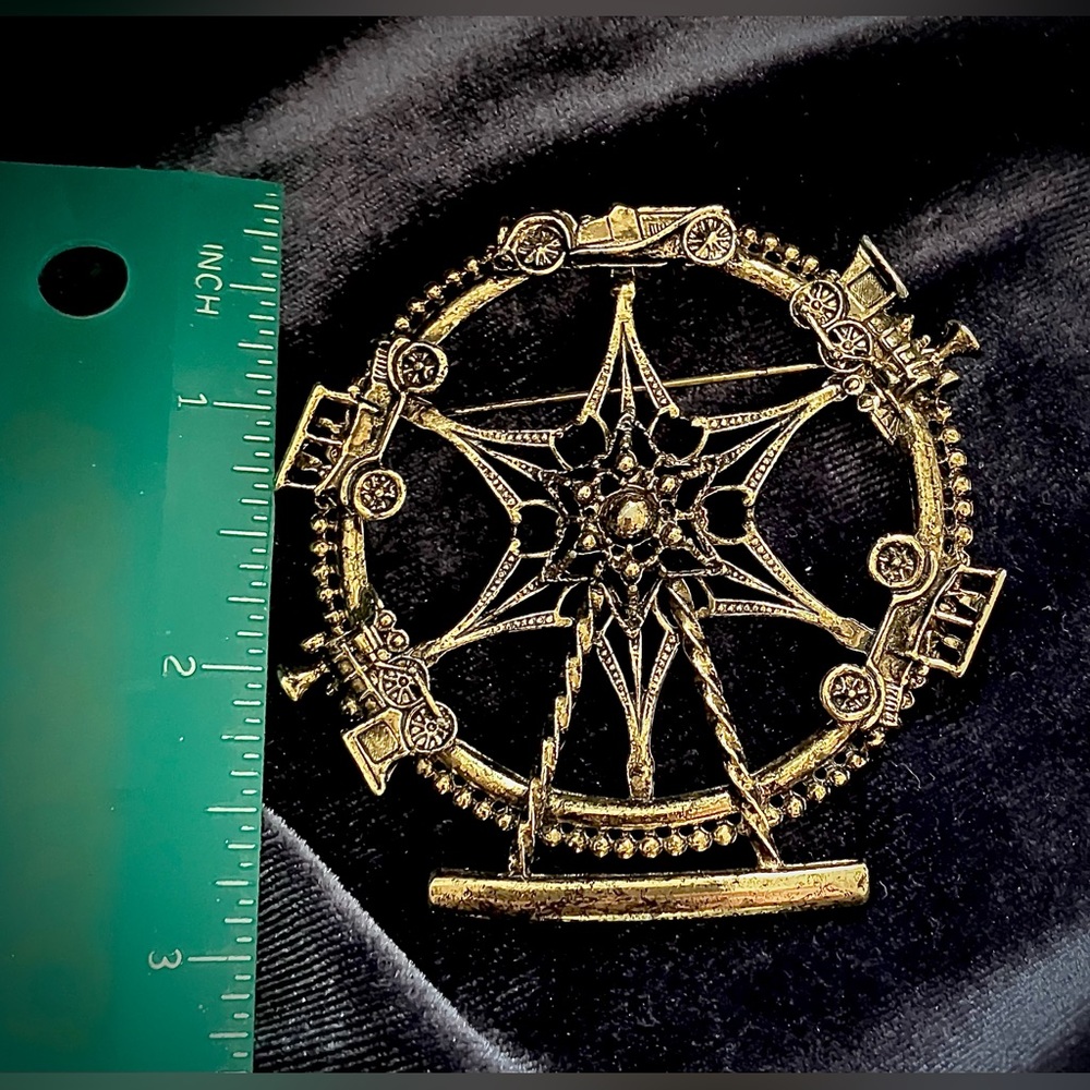 Vintage Ferris wheel automobile themed gold-tone antique brooch